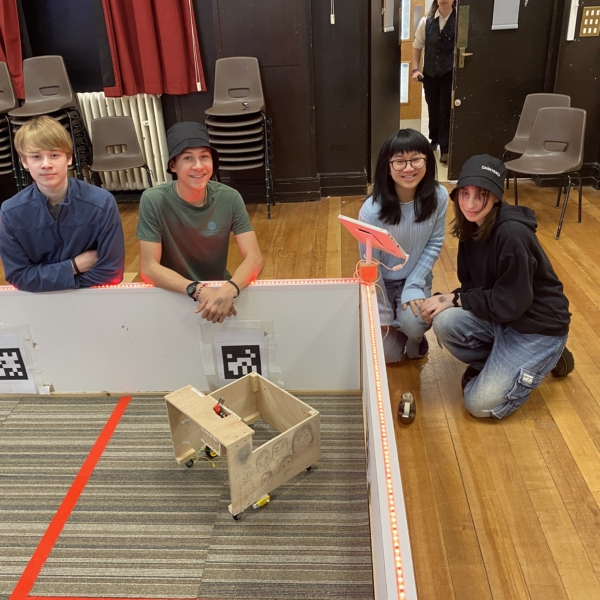 Heritage pupils competing with robots at RoboCon.