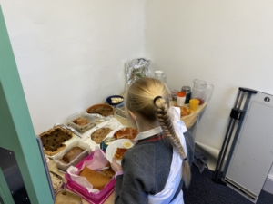Year 5 pupils enjoy a Roman Saturnalia banquet during their Latin lessons