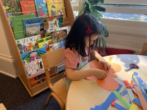 Heritage Upper Prep pupils do a paper weaving craft.