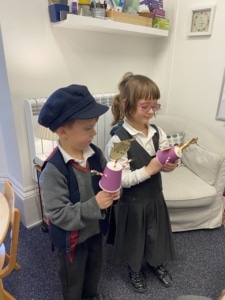 Upper Prep pupils holding their finished puppet