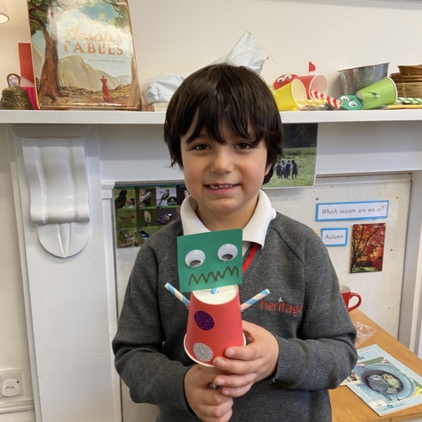 Upper Prep pupil holding their finished puppet