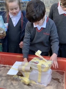 Year 2 pupils crafted and tested boats to explore the science of buoyancy