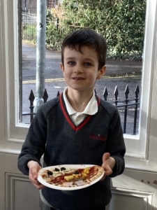 Heritage Year 2 pupils make pizzas during an enrichment session