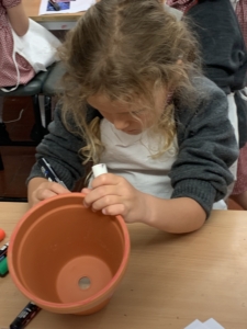 Heritage Y2 pupils decorating plant pots