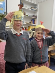 Heritage Year 2 pupils made and tried on their own Roman helmets