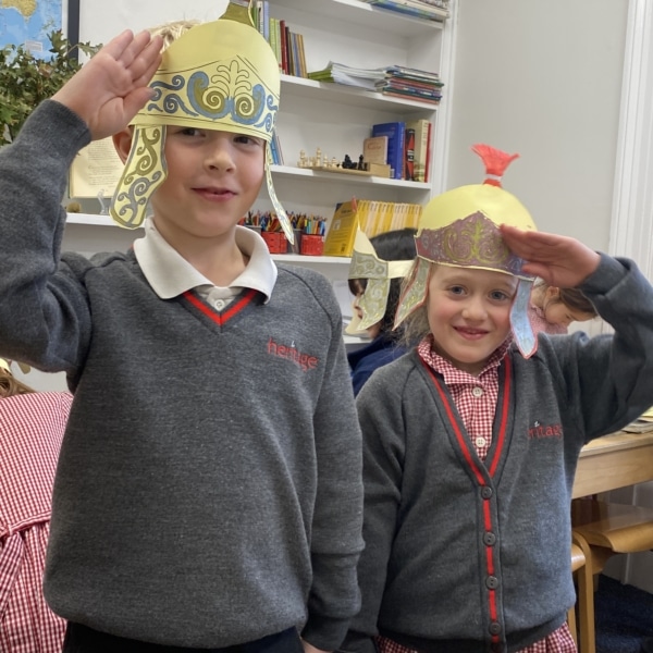 Heritage Year 2 pupils made and tried on their own Roman helmets