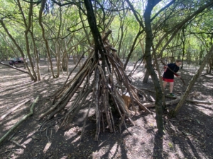 Heritage Year 6 pupils building dens at Anglesey Abbey