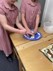 Heritage Year 6 pupils bake bread during an enrichment session