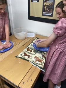 Heritage Year 6 pupils bake bread during an enrichment session