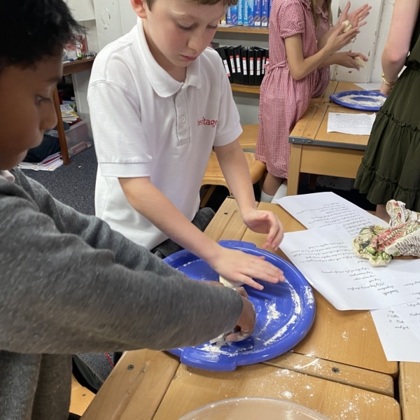 Heritage Year 6 pupils bake bread during an enrichment session