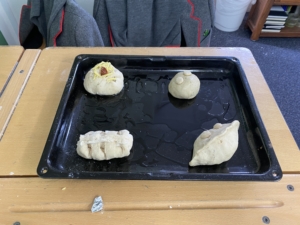 Heritage Year 6 pupils bake bread during an enrichment session