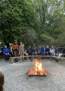 Year 7 and 8 pupils taking part in outdoor activities during Peak District residential camp